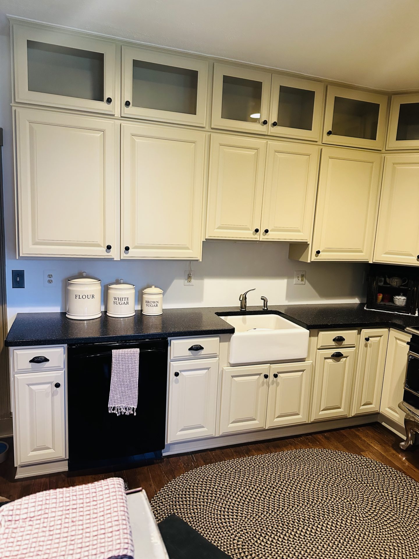 Freshly painted cabinets services results in kitchen space